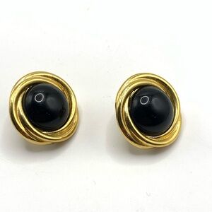 Vintage Trifari signed Back and Gold tone swirl pierced Earrings